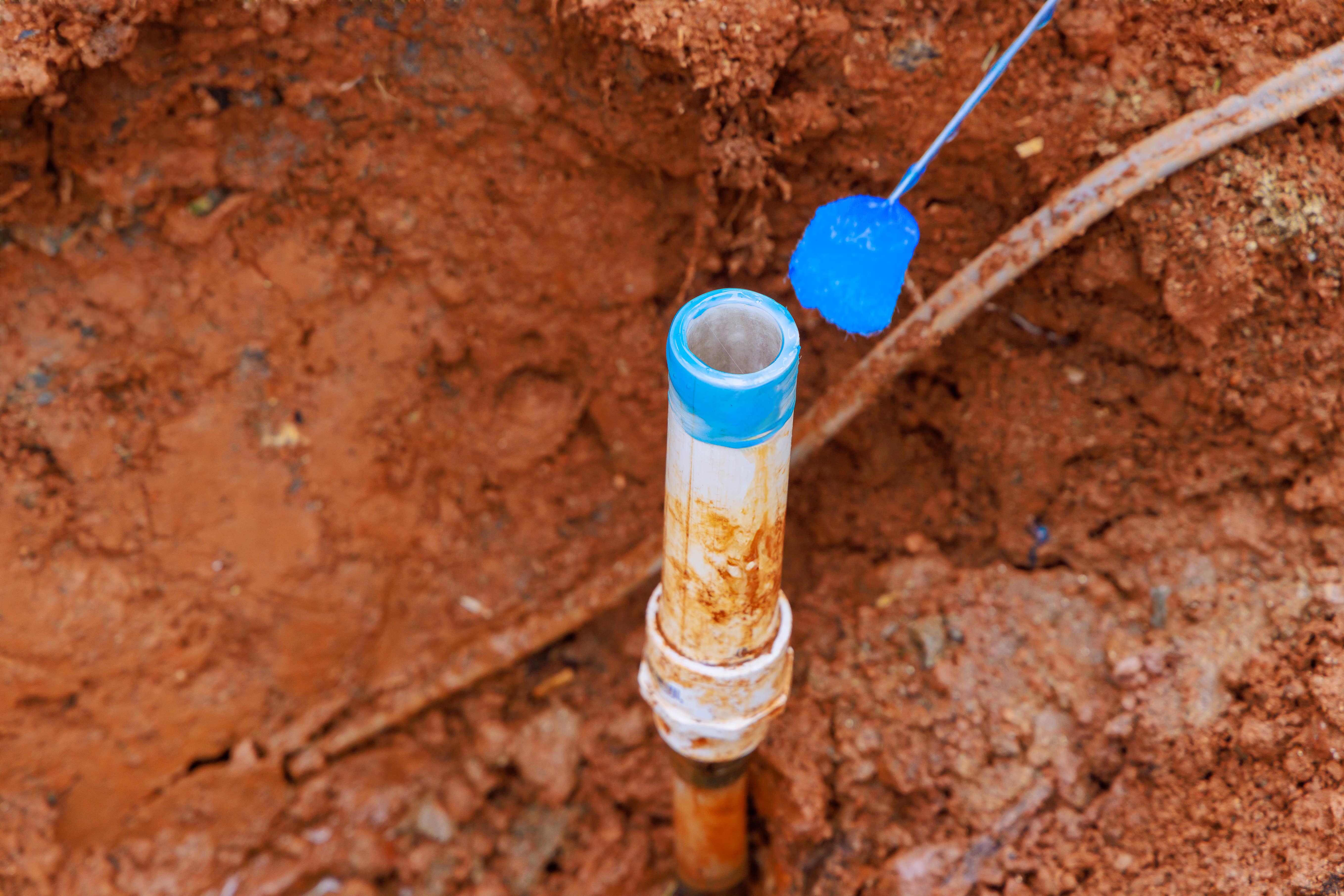 prior-to-gluing-pvc-plastic-pipe-a-plumber-min